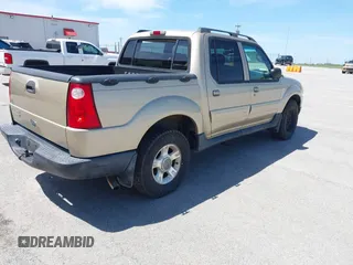 2003 Ford Explorer Sport Trac XLS with VIN 1FMZU77E83UA65631, listed as a IAAI auction lot 42133011 with 112,112 mi miles and . Bid and sale history available at DreamBid. Image 4.