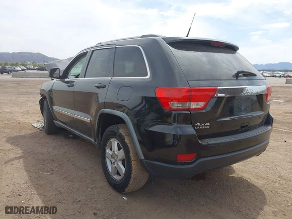 2011 Jeep Grand Cherokee Laredo with VIN 1J4RR4GGXBC506728, listed as a IAAI auction lot 41889334 with 236,099 mi miles. Bid and sale history available at carsss.com. Image 3.