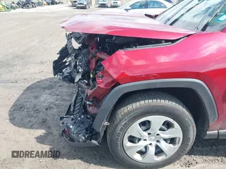 2019 Toyota RAV4 LE with VIN JTMG1RFV2KD005523, listed as a IAAI auction lot 41910005 with 64,119 mi miles. Bid and sale history available at carsss.com. Image 6.