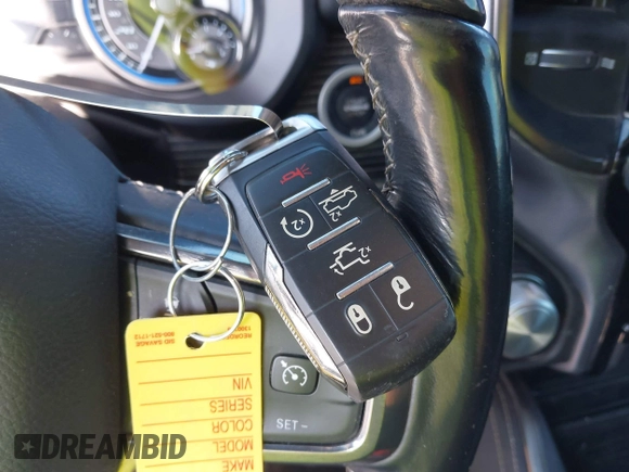 2020 Ram 1500 Limited with VIN 1C6SRFHT1LN219449, listed as a IAAI auction lot 42124421 with 117,976 mi miles and . Bid and sale history available at DreamBid. Image 11.