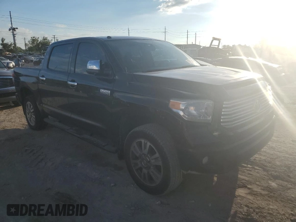 2014 Toyota Tundra 4WD Truck Platinum with VIN 5TFAW5F18EX364598, listed as a Copart auction lot 73925464 with 153,922 mi miles and Salvage Title. Bid and sale history available at carsss.com. Image 4.
