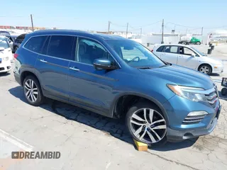 2017 Honda Pilot Touring с VIN 5FNYF5H94HB011050, выставлен на аукционе IAAI как лот 42636786 с пробегом 107 060 миль миль и . История ставок и продаж доступна на DreamBid. Изображение 1.