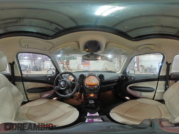 2013 MINI Countryman S ALL4 with VIN WMWZC5C5XDWM16477, listed as a Copart auction lot 51666385 with 112,383 mi miles and Salvage title. Bid and sale history available at DreamBid. Image 12.