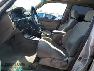 1999 Toyota 4Runner SR5 with VIN JT3GN86R4X0099618, listed as a Copart auction lot 58204145 with 297,759 mi miles and Salvage title. Bid and sale history available at DreamBid. Image 7.