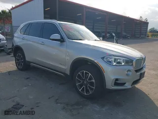 2018 BMW X5 xDrive40e iPerformance with VIN 5UXKT0C53J0V98060, listed as a IAAI auction lot 41456809 with 75,407 mi miles. Bid and sale history available at carsss.com. Image 1.