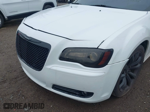 2014 Chrysler 300 S with VIN 2C3CCABG9EH355602, listed as a IAAI auction lot 42244756 with 165,816 mi miles and . Bid and sale history available at DreamBid. Image 6.