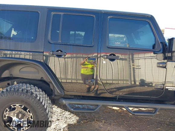2008 Jeep Wrangler Unlimited X с VIN 1J4GA39178L652983, выставлен на аукционе IAAI как лот 40803698 с пробегом 114 012 миль миль и . История ставок и продаж доступна на DreamBid. Изображение 14.