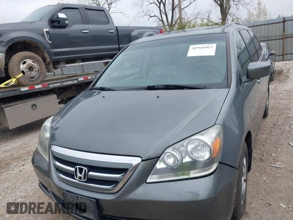 2007 Honda Odyssey EX-L with VIN 5FNRL38627B413638, listed as a IAAI auction lot 41960963 with 172,968 mi miles and . Bid and sale history available at DreamBid. Image 6.