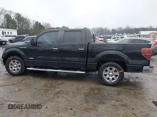 2011 Ford F-150 XLT with VIN 1FTFW1CT5BFB13799, listed as a IAAI auction lot 41426609 with 200,000 mi miles. Bid and sale history available at carsss.com. Image 13.