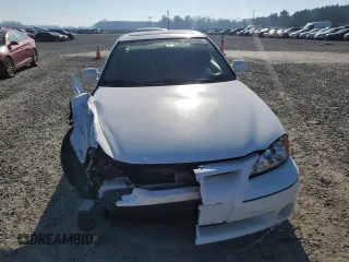 1999 Pontiac Grand Am GT with VIN 1G2NW12EXXM754842, listed as a Copart auction lot 46940335 with 124,886 mi miles and Salvage Title. Bid and sale history available at carsss.com. Image 5.