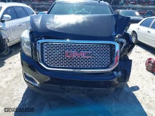 2016 GMC Yukon XL Denali with VIN 1GKS1HKJ5GR435925, listed as a IAAI auction lot 41727259 with 137,098 mi miles. Bid and sale history available at carsss.com. Image 6.