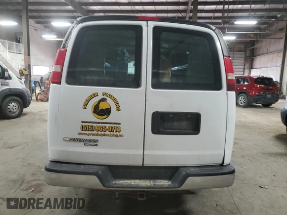 2014 Chevrolet Express Cargo with VIN 1GCWGFBA8E1125053, listed as a Copart auction lot 51690415 with 165,609 mi miles and Salvage title. Bid and sale history available at DreamBid. Image 6.