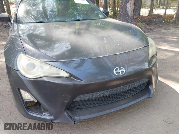 2013 Scion FR-S with VIN JF1ZNAA12D1718693, listed as a IAAI auction lot 42077260 with 110,164 mi miles. Bid and sale history available at carsss.com. Image 6.