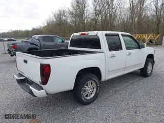 2011 Chevrolet Colorado LT w/1LT with VIN 1GCHTCFE6B8141559, listed as a IAAI auction lot 41812559 with 147,848 mi miles. Bid and sale history available at carsss.com. Image 4.