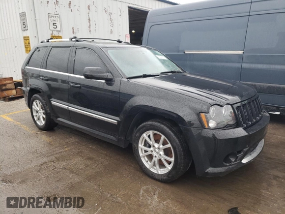 2008 Jeep Grand Cherokee SRT-8 with VIN 1J8HR78358C100954, listed as a Copart auction lot 79218914 with 123,254 mi miles and Clean Title. Bid and sale history available at carsss.com. Image 4.