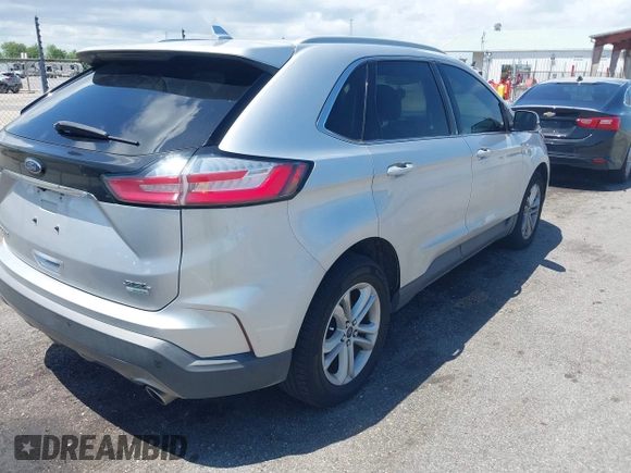 2019 Ford Edge SEL with VIN 2FMPK3J94KBB67207, listed as a IAAI auction lot 42758134 with 154,823 mi miles and . Bid and sale history available at DreamBid. Image 4.
