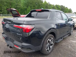 2022 Hyundai Santa Cruz Limited z VIN 5NTJEDAF3NH010999, wystawiony jako IAAI lot #42234746 z przebiegiem 18 463 mil mil oraz . Historia ofert i sprzedaży dostępna na DreamBid. Obrazek 4.