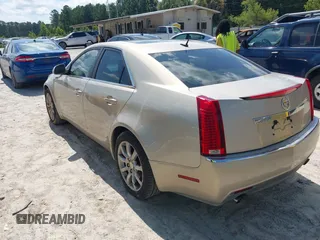 2008 Cadillac CTS RWD with VIN 1G6DF577X80208661, listed as a IAAI auction lot 42520115 with 104,756 mi miles and . Bid and sale history available at DreamBid. Image 3.