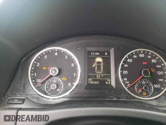 2012 Volkswagen Tiguan SE z VIN WVGAV7AX5CW563536, wystawiony jako Copart lot #52407665 z przebiegiem 136 263 mil mil oraz Szkody całkowita. Historia ofert i sprzedaży dostępna na DreamBid. Obrazek 9.