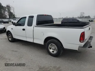 2000 Ford F-150 XL с VIN 1FTZX1725YNB58607, выставлен на аукционе Copart как лот 48706575 с пробегом 286 898 миль миль и Списание • Salvage title. История ставок и продаж доступна на DreamBid. Изображение 2.