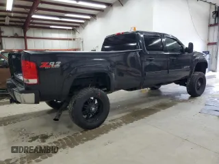 2012 GMC Sierra 2500HD SLE z VIN 1GT120CG6CF169156, wystawiony jako Copart lot #52860205 z przebiegiem 106 505 mil mil oraz Szkoda całkowita • Salvage title. Historia ofert i sprzedaży dostępna na DreamBid. Obrazek 3.