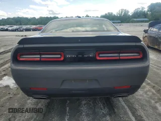 2019 Dodge Challenger SXT z VIN 2C3CDZAG5KH604003, wystawiony jako Copart lot #56694895 z przebiegiem 63 409 mil mil oraz Szkoda całkowita • Salvage title. Historia ofert i sprzedaży dostępna na DreamBid. Obrazek 6.