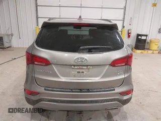 2017 Hyundai Santa Fe 2.4L z VIN 5XYZUDLBXHG447389, wystawiony jako IAAI lot #42249551 z przebiegiem 178 084 mil mil oraz . Historia ofert i sprzedaży dostępna na DreamBid. Obrazek 17.