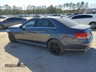 2014 Mercedes-Benz E 350 Sport with VIN WDDHF5KB6EA969855, listed as a Copart auction lot 49295495 with 63,898 mi miles and Salvage Title. Bid and sale history available at DreamBid. Image 2.