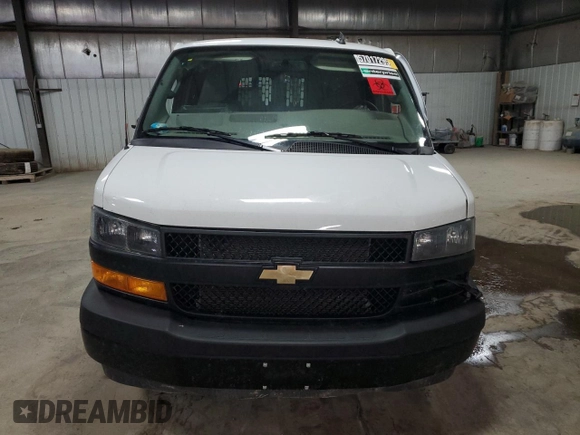2023 Chevrolet Express Cargo with VIN 1GCWGAFP1P1109667, listed as a Copart auction lot 57017295 with Not provided miles and Salvage title. Bid and sale history available at DreamBid. Image 5.