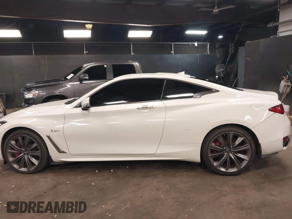 2018 Infiniti Q60 RED SPORT 400 with VIN JN1FV7EL3JM630017, listed as a IAAI auction lot 41697880 with 73,951 mi miles. Bid and sale history available at carsss.com. Image 14.