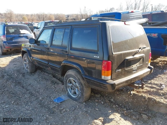 1999 Jeep Cherokee Sport with VIN 1J4FF68S8XL673655, listed as a IAAI auction lot 40981087 with 152,328 mi miles. Bid and sale history available at carsss.com. Image 3.