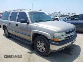 2002 Chevrolet Suburban LT z VIN 1GNFK16T92J208121, wystawiony jako IAAI lot #42163490 z przebiegiem 177 145 mil mil oraz . Historia ofert i sprzedaży dostępna na DreamBid. Obrazek 1.