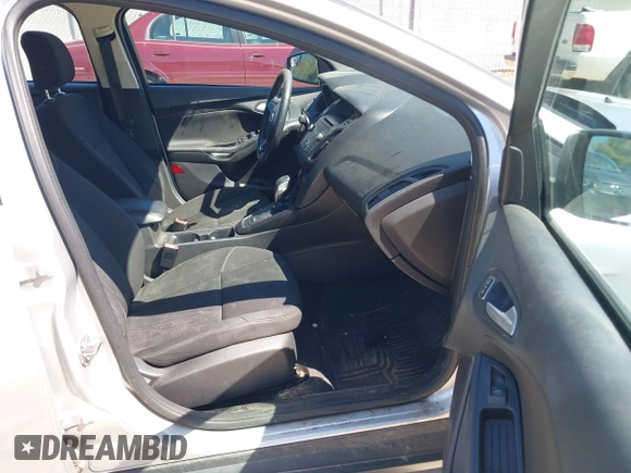 2017 Ford Focus SE z VIN 1FADP3F21HL237412, wystawiony jako IAAI lot #42188886 z przebiegiem 148 355 mil mil oraz . Historia ofert i sprzedaży dostępna na DreamBid. Obrazek 5.
