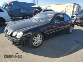 2002 Mercedes-Benz CL-Class with VIN WDBPJ75JX2A030740, listed as a Copart auction lot 42142025 with 82,576 mi miles and Salvage Title. Bid and sale history available at carsss.com. Image 1.