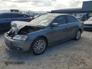 2014 Volkswagen Jetta SEL z VIN 3VWL07AJ5EM233340, wystawiony jako Copart lot #60315115 z przebiegiem 206 778 mil mil oraz Szkoda całkowita • Salvage title. Historia ofert i sprzedaży dostępna na DreamBid. Obrazek 1.