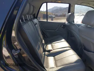 2001 Mercedes-Benz M-Class with VIN 4JGAB54E01A272539, listed as a IAAI auction lot 42124321 with 272,098 mi miles. Bid and sale history available at carsss.com. Image 8.