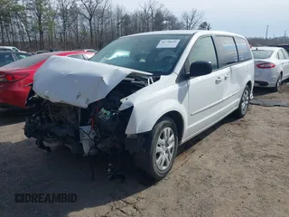 2017 Dodge Grand Caravan SE Plus z VIN 2C4RDGBGXHR655881, wystawiony jako IAAI lot #41738830 z przebiegiem 105 305 mil mil oraz . Historia ofert i sprzedaży dostępna na DreamBid. Obrazek 16.