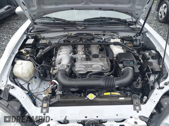 2002 Mazda MX-5 Miata Cloth z VIN JM1NB353620221304, wystawiony jako IAAI lot #41178747 z przebiegiem 98 958 mil mil oraz . Historia ofert i sprzedaży dostępna na DreamBid. Obrazek 10.