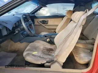 1992 Pontiac Firebird z VIN 1G2FS23T0NL203325, wystawiony jako Copart lot #76359414 z przebiegiem 198 651 mil mil oraz Nie do naprawy • Non repairable. Historia ofert i sprzedaży dostępna na DreamBid. Obrazek 7.