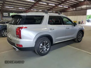 2022 Hyundai Palisade SEL z VIN KM8R24HE6NU404781, wystawiony jako Copart lot #57979005 z przebiegiem 88 069 mil mil oraz Czysty tytuł • Clean title. Historia ofert i sprzedaży dostępna na DreamBid. Obrazek 3.