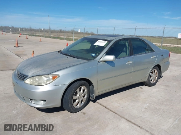 2005 Toyota Camry LE with VIN JTDBF32KX50162491, listed as a IAAI auction lot 41828892 with 98,541 mi miles and . Bid and sale history available at DreamBid. Image 2.