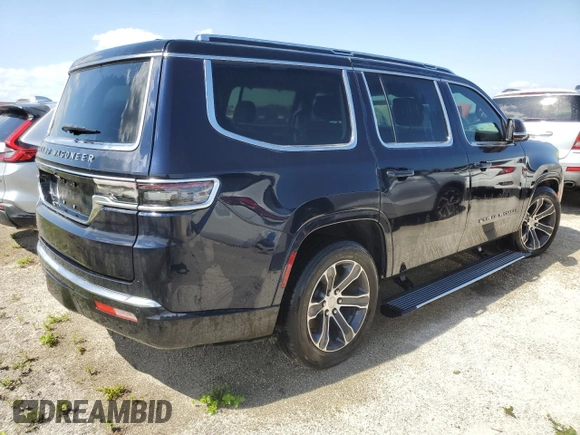 2023 Jeep Grand Wagoneer with VIN 1C4SJVEJ7PS506234, listed as a Copart auction lot 74534244 with 13,586 mi miles and Non repairable. Bid and sale history available at DreamBid. Image 3.