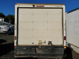 2021 Ford Econoline Cargo with VIN 1FDWE3FK7MDC21644, listed as a Copart auction lot 82983994 with Not Provided miles and Salvage Title. Bid and sale history available at DreamBid. Image 6.