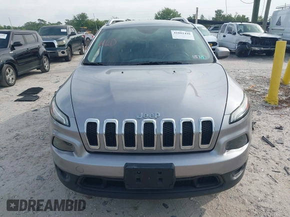 2014 Jeep Cherokee Altitude with VIN 1C4PJMCB4EW107556, listed as a IAAI auction lot 41881448 with 212,816 mi miles and . Bid and sale history available at DreamBid. Image 13.