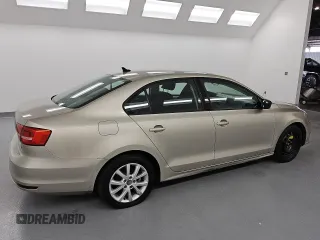 2015 Volkswagen Jetta SE with VIN 3VWD17AJ3FM213140, listed as a Copart auction lot 59301985 with 117,417 mi miles and Clean title. Bid and sale history available at DreamBid. Image 3.