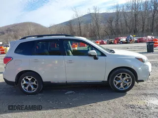 2017 Subaru Forester Touring with VIN JF2SJAWC0HH550052, listed as a IAAI auction lot 41475102 with 115,600 mi miles and . Bid and sale history available at DreamBid. Image 13.