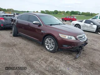 2012 Ford Taurus Limited z VIN 1FAHP2FW7CG133264, wystawiony jako IAAI lot #42184346 z przebiegiem 169 561 mil mil oraz . Historia ofert i sprzedaży dostępna na DreamBid. Obrazek 1.