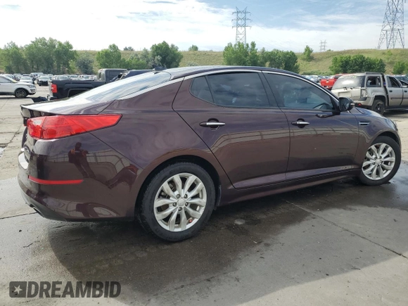 2015 Kia Optima EX with VIN 5XXGN4A79FG409057, listed as a Copart auction lot 62094465 with 123,346 mi miles and Salvage title. Bid and sale history available at DreamBid. Image 3.