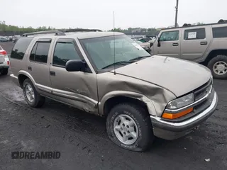 2000 Chevrolet Blazer LT with VIN 1GNDT13W9YK287456, listed as a IAAI auction lot 42450504 with 139,649 mi miles and . Bid and sale history available at DreamBid. Image 1.