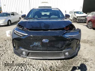 2023 Subaru Solterra Premium с VIN JTMABABA9PA022349, выставлен на аукционе Copart как лот 73167143 с пробегом 1 199 миль миль и . История ставок и продаж доступна на DreamBid. Изображение 5.